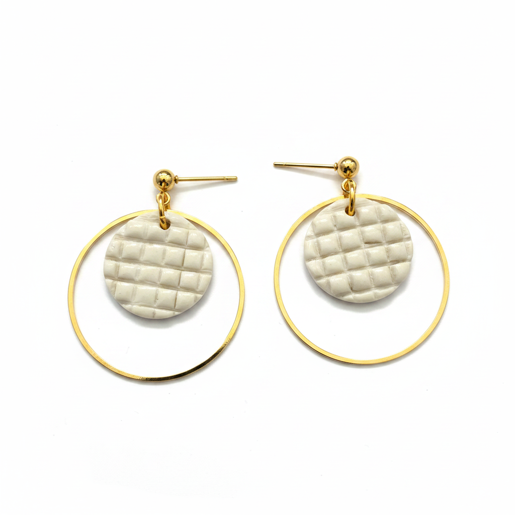 Cloud Nine Hoop Earrings on a clean white background with both gold hoops showing consistent warm gold color